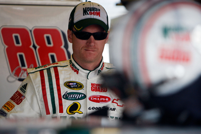 Dale Earnhardt Jr. waits for NASCAR Sprint Cup Series practice to get under way at Darlington Raceway (Photo Credit: Chris Graythen / Getty Images)