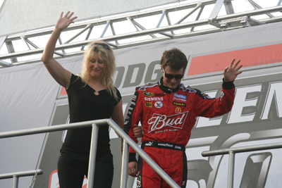 Tammy Kahne and her son Kasey wave to the Darlington Raceway crowd before the Dodge Challenger 500 (Photo Credit: Jerry Markland/Getty Images for NASCAR)