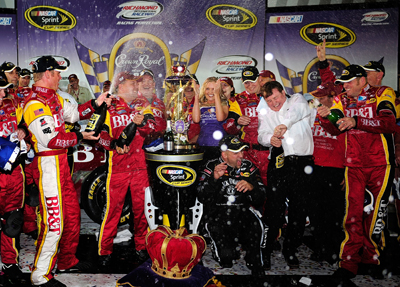 Clint Bowyer and his team celebrate winning the Crown Royal Presents The Dan Lowry 400 at Richmond International Raceway. (Photo Credit: Rusty Jarrett/Getty Images for NASCAR)