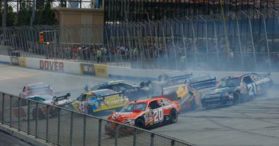 A 10-car crash brought out the first caution of the Best Buy 400 Benefiting Student Clubs for Autism Speaks NASCAR Sprint Cup Series race at Dover International Speedway. The race red-flagged for 16 minutes and 13 seconds to clean up the track. (Photo Credit: Nick Laham/Getty Images)