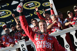 Carl Edwards, driver of the No. 99 Office Depot Ford, in Victory Lane as the winner of the NASCAR Sprint Cup Series Sunoco Red Cross Pennsylvania 500 on Sunday at Pocono Raceway. (Photo Credit: Jason Smith/Getty Images for NASCAR)