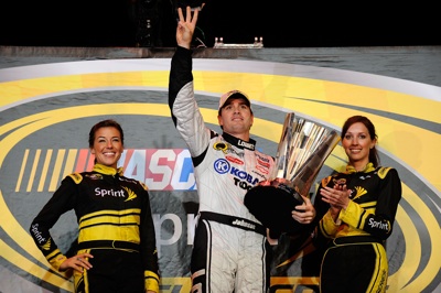 Jimmie Johnson (C), driver of the #48 Lowe's/Kobalt Tools Chevrolet, celebrates after winning the 2008 NASCAR Sprint Cup Series Championship after the Ford 400 at Homestead-Miami Speedway on November 16, 2008 in Homestead, Florida.  (Photo by Rusty Jarrett/Getty Images for NASCAR)