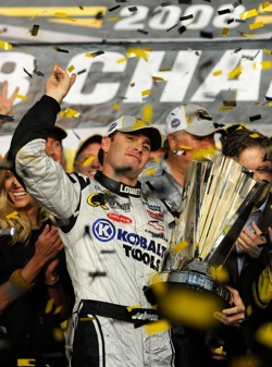 Jimmie Johnson, driver of the #48 Lowe's/Kobalt Tools Chevrolet, celebrates after winning the 2008 NASCAR Sprint Cup Series Championship after the Ford 400 at Homestead-Miami Speedway on November 16, 2008 in Homestead, Florida.  (Photo by Rusty Jarrett/Getty Images for NASCAR)