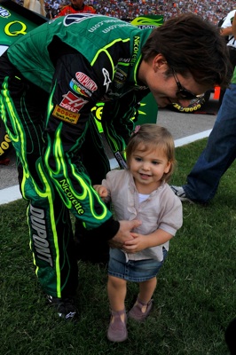Jeff Gordon, driver of the No. 24 DuPont Chevrolet, started from the pole position and finished second in Sunday's NASCAR Sprint Cup event at Texas Motor Speedway. Here he is prerace with daughter Ella Sofia. (Courtesy Hendrick Motorsports)