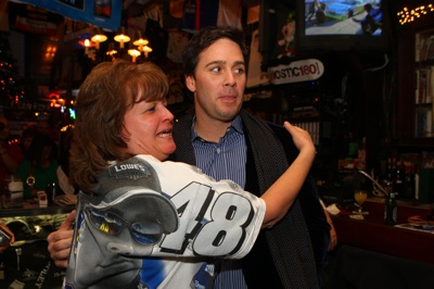 A Jimmie Johnson fan meets her man Wednesday at Foley's in New York City during Champions Week. (Photo Credit: Mike Stobe/Getty Images for NASCAR)