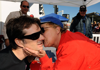 NASCAR Sprint Cup driver of the No. 24 DuPont Chevrolet Jeff Gordon thought a fan just wanted to whisper something in his ear, but what he got was a kiss on the cheek on Saturday at the Preseason Thunder Fan Fest at Daytona International Speedway. (Photo Credit: Rusty Jarrett/Getty Images for NASCAR)
