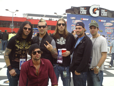 The band Rev Theory at Auto Club Speedway in Fontana, CA on Sunday, February 22, 2009. (Photo credit: The Fast and the Fabulous)