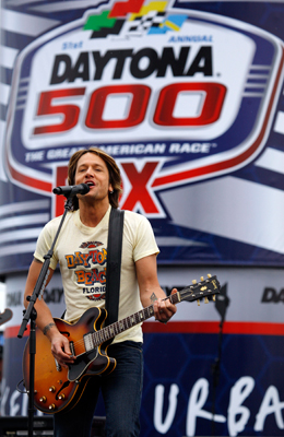 Country star Keith Urban performs a pre-race concert prior to the Daytona 500 at Daytona International Speedway. (Photo Credit: Chris Graythen/Getty Images)