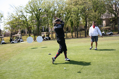 Kyle Petty tees off during the AutoTrader.com Gears & Greens Charity Golf Classic on April 2, 2009 in Fort Worth, Texas. (Photo by Tom Pennington/Getty Images for Texas Motor Speedway)