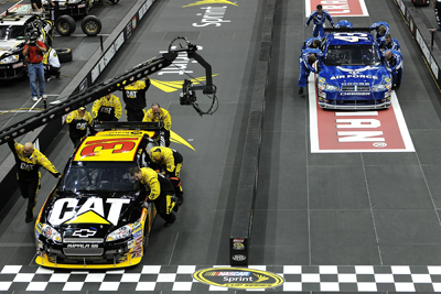 Left to right) The No. 31 Richard Childress Racing Caterpillar team defeats the No. 43 Richard Petty Motorsports Air Force team in the NASCAR Sprint Pit Crew Challenge Presented by Craftsman Final Thursday at Time Warner Cable in Charlotte, N.C. (Photo Credit: John Harrelson/Getty Images for NASCAR)