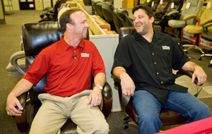Office Depot At The Speed of Smart sweepstakes winner Eddie Bell and NASCAR Sprint Cup driver Tony Stewart try out office chairs at a local Office Depot store in Charlotte, N.C.