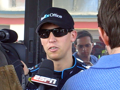 Denny Hamlin speaks with the media during his press conference outside his hauler at Infineon Raceway on Friday, June 19, 2009 (photo credit: The Fast and the Fabulous)