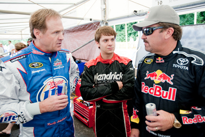 (Left to right) NASCAR Sprint Cup Series champion Rusty Wallace, Hendrick Motorsports driver Landon Cassill and NASCAR Camping World Truck Series driver Mike Skinner talk during The Goodwood Festival of Speed at The Goodwood Estate on Friday in Chichester, England. (Photo Credit: Peter Fox/Getty Images for NASCAR)