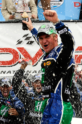 Clint Bowyer celebrates winning the Dover 200 at Dover International Speedway, his second win of the season. (Photo Credit: Jeff Zelevansky/Getty Images)