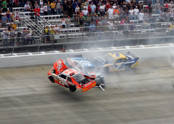 Joey Logano was involved in a spectacular accident going into Turn 3 on Lap 31 of the AAA 400 at Dover International Speedway. Logano rolled his car several times, but walked away from the accident with no injuries. (Photo Credit: Jerry Markland/Getty Images for NASCAR)