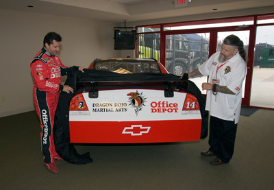 Tony Stewart introduced Dragon Dojo Martial Arts, owned by Shihan Robert Wiest, as the 2009 Official Small Business of NASCAR, Courtesy of Office Depot during a special press event at the speedway on Saturday, September 5, 2009 (credit to Action Sports Photography)