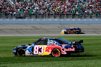Chase for the Sprint Cup first-time contender Brian Vickers, driver of the No. 83 Red Bull Toyota, spun out in the infield grass in Turn 4 to bring out the caution on lap 149 during Sunday's NASCAR Sprint Cup Series Price Chopper 400 presented by Kraft Foods at the Kansas Speedway. It wasn't a good day for Vickers, who ended up finishing in 37th after having engine problems. (Photo Credit: Rusty Jarrett/Getty Images for NASCAR)