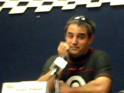 Juan Pablo Montoya answers the media's questions on Friday, October 9, 2009 at Auto Club Speedway in Fontana, CA (photo credit: The Fast and the Fabulous)