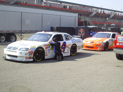 Cars get ready to roll out for practice on Friday, October 9, 2009 at Auto Club Speedway in Fontana, CA (photo credit: The Fast and the Fabulous)