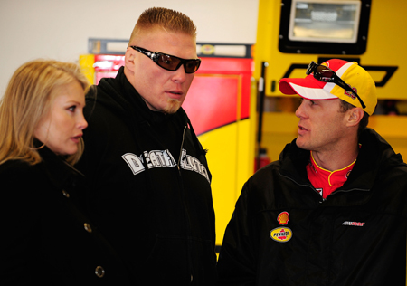 NASCAR Sprint Cup Series driver Kevin Harvick, who was second-fastest behind fellow Richard Childress Racing driver Jeff Burton in final practice, talks with MMA fighter Brock Lesnar in the garage during Daytona 500 final practice. (Credit: Jason Smith/Getty Images for NASCAR)