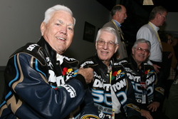 Daytona 500 Grand Marshall Junior Johnson (left) jokes with Honorary Starters Glen (middle) and Leonard Wood during the pre-race Drivers Meeting. (Credit: Jerry Markland/Getty Images for NASCAR)