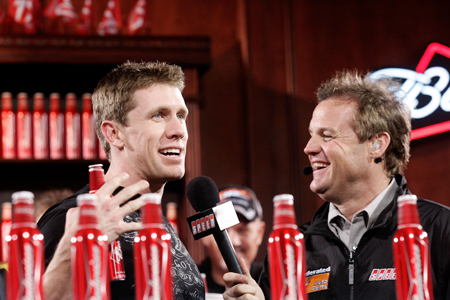 Carl Edwards talks with SPEED's Kenny Wallace Thursday after drawing the poll for the Budweiser Shootout (Credit: Jason Smith/Getty Images for NASCAR)
