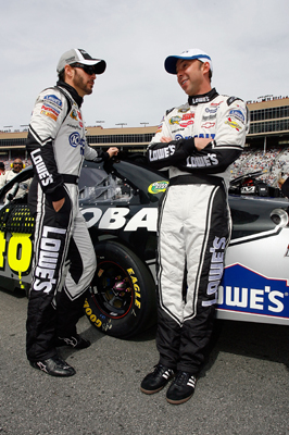 Jimmie Johnson talks with crew chief Chad Knaus before the start of Sunday’s NASCAR Sprint Cup Series Kobalt Tools 500. (Credit: Jason Smith/Getty Images for NASCAR)