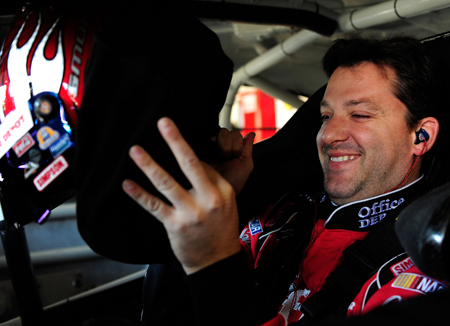 Tony Stewart straps in with a smile during practice for Sunday’s NASCAR Sprint Cup Series Kobalt Tools 500 at Atlanta Motor Speedway. (Credit: Rusty Jarrett/Getty Images for NASCAR)