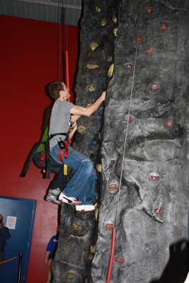 Kasey Kahne takes on the rock climbing wall at Fun Expedition in Johnson City, Tenn. during a visit Thursday to promote the upcoming NASCAR weekend at Bristol Motor Speedway(Credit: Bristol Motor Speedway)