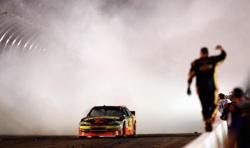 Ryan Newman does a burnout to celebrate his Subway Fresh Fit 600 victory at Phoenix International Raceway.( Credit: Tom Pennington/Getty Images for NASCAR)
