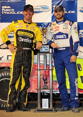 Clint Bowyer, Jimmie Johnson's car owner poses with Jimmie and the trophy after winning the Gillette Fusion ProGlide Prelude to the Dream at Eldora Speedway on June 9, 2010 in Rossburg, Ohio. (Photo by Rusty Jarrett/Getty Images for True Speed Communication)