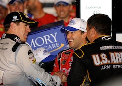 Tony Stewart is congratulated by race runner-up Carl Edwards and Stewart Haas Racing teammate Ryan Newman in Victory Lane at Atlanta Motor Speedway after winning the NASCAR Sprint Cup Series Emory Healthcare. (Credit: Rusty Jarrett/Getty Images for NASCAR)
