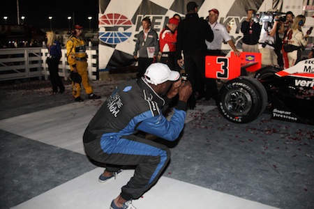 Terrell Owens takes photos in Victory Lane