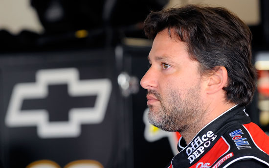 NASCAR Sprint Cup Series driver Tony Stewart looks on as his crew makes adjustments to the No. 14 Office Depot Chevrolet Saturday at Daytona International Speedway in Daytona Beach, Fla. during Preseason Thunder testing.(Credit: Jared C. Tilton/Getty Images for NASCAR)