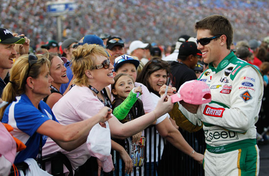 Going for a weekend sweep, Carl Edwards greets fans prior to the NASCAR Sprint Cup Series Samsung Mobile 500 at Texas Motor Speedway on Saturday in Fort Worth, Texas. (Credit: Tom Pennington/Getty Images for NASCAR)