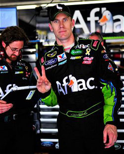 Carl Edwards, driver of the #99 AFLAC Ford, gestures in the garage area, after practice for the NASCAR Sprint All-Star Race at Charlotte Motor Speedway on May 20, 2011 in Charlotte, North Carolina. (Photo by Jason Smith/Getty Images for NASCAR) 