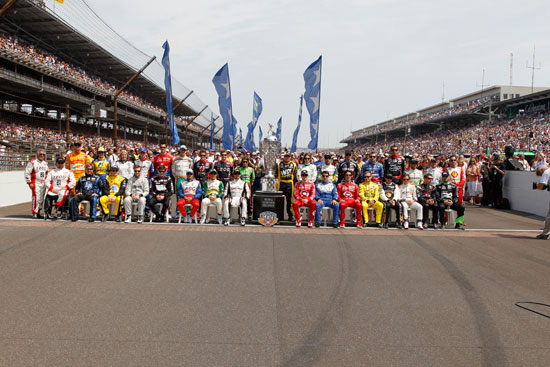 All 33 drivers take the traditional group photo on the start/finish line at the Indianapolis Motor Speedway