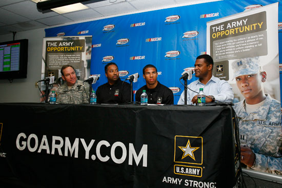 (L-R) Lt. Gen. Benjamin C. Freakley, commander of the U.S. Army Accessions Command, Revolution Racing CEO Max Siegel, Darrell Wallace Jr and NASCAR Vice President of Public Affairs and Multicultural Development announce a partnership between the U.S. Army and Revolution Racing. (Credit: John Harrelson/Getty Images for NASCAR)