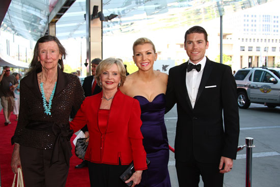 Indianapolis Motor Speedway chairman Mari Hulman George arrives with Florence Henderson, and Mari's grandson Jarrod Krisiloff and his wife, Megan.