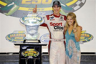 Joey Logano, driver of the #20 Sport Clips Toyota, celebrates with his girlfriend, Sabrina Simpson, after winning the NASCAR Nationwide Series Subway Jalapeno 250 Powered by Coca-Cola at Daytona International Speedway on July 1, 2011 in Daytona Beach, Florida. (Photo by Jared C. Tilton/Getty Images) 