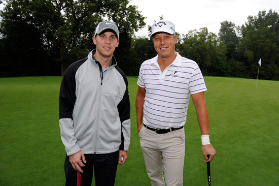 Denny Hamlin, (L), NASCAR Sprint Cup Series driver of the No. 11 Joe Gibbs Racing FedEx Toyota Camry, and playing partner Fredrik Jacobson, (R), of Sweden pose for a photo during the Pro-Am round for the BMW Championship at Cog Hill Golf & Country Club on Wednesday in Lemont, Ill. Hamlin is in town for the Chase for the NASCAR Sprint Cup, which begins this weekend at Chicagoland Speedway in Joliet, Ill. (Credit: Stan Badz/PGA TOUR)