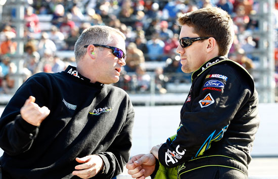 No. 99 crew chief Bob Osborne and driver Carl Edwards talk before the NASCAR Sprint Cup Series TUMS Fast Relief 500 at Martinsville Speedway on Sunday. (Credit: Jeff Zelevansky/Getty Images for NASCAR)