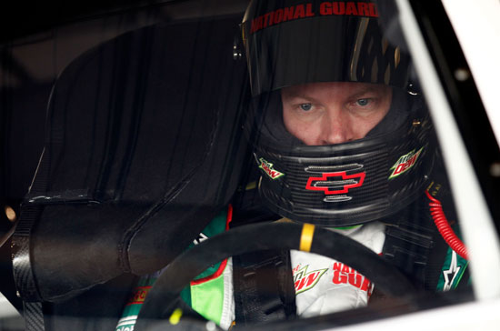 Dale Earnhardt Jr. sits in the cockpit during the one NASCAR Sprint Cup Series practice of the weekend on Saturday at Martinsville Speedway. With a 95.554 mph/19.817 seconds lap, Earnhardt Jr. was the third-fastest Chase for the NASCAR Sprint Cup Series driver in the session. (Credit: Jeff Zelevansky/Getty Images for NASCAR)