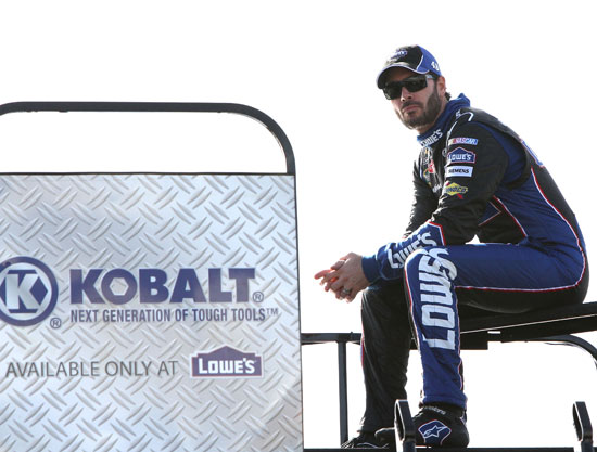 Jimmie Johnson takes in NASCAR Sprint Cup Series practice from a hauler-top vantage point at Homestead-Miami Speedway on Saturday, Nov. 19.(Credit: By Jerry Markland, Getty Images for NASCAR)