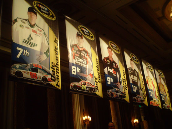 Banners for the top-12 drivers lined the walls of the Bellagio ballroom