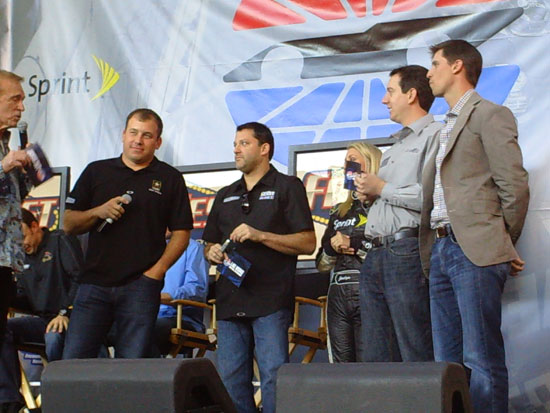 Ryan Newman and Tony Stewart battle Kyle Busch and Denny Hamlin in the finals