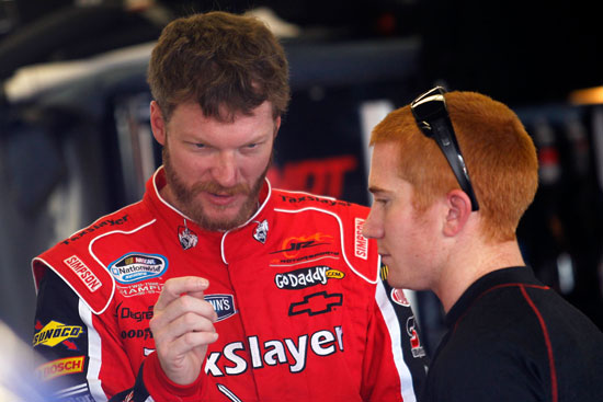 Dale Earnhardt Jr. passes on restrictor plate wisdom to his new driver, Cole Whitt. (Credit: Todd Warshaw/Getty Images for NASCAR)