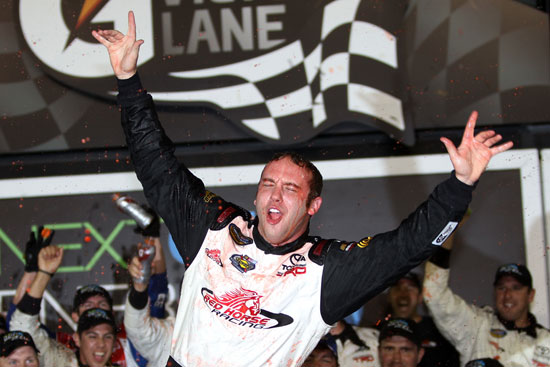 John King, driver of the #7 Red Horse Racing Toyota, celebrates in Victory Lane after winning the NASCAR Camping World Truck Series NextEra Energy Resources 250 at Daytona International Speedway on February 24, 2012 in Daytona Beach, Florida. (Photo by Jerry Markland/Getty Images for NASCAR)