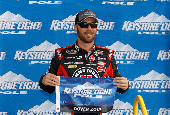 Kevin Harvick, driver of the #2 Tide Chevrolet, poses with the Keystone Light Pole award after qualifying for the pole position for the NASCAR Camping World Truck Series Lucas Oil 200 at Dover International Speedway on June 1, 2012 in Dover, Delaware. (Photo by Todd Warshaw/Getty Images)