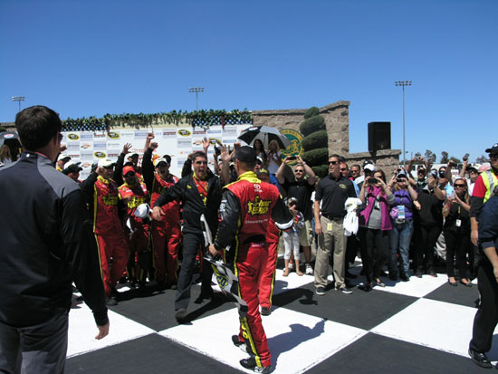 Clint Bowyer's crew greets him (happily) in victory lane at Sonoma last month. Credit: Keri Luiz